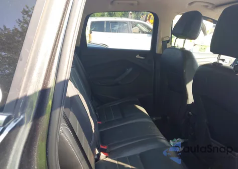 2016 Ford Escape Titanium z USA, uszkodzony, nr VIN 1FMCU9J94GUB85476